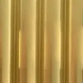 Rug section with vertical brushed brass bars on a cream background, displaying a linear ribbed texture and muted metallic sheen.